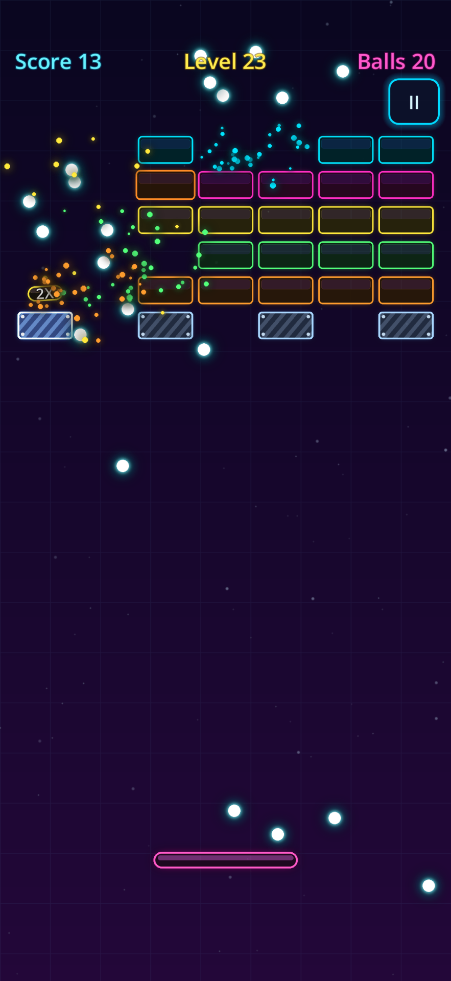 Bounce Em Balls gameplay with a bomb brick chain-exploding and a 2X score capsule dropping